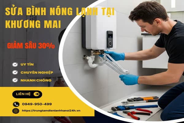 Kỹ thuật viên sửa chữa bình nóng lạnh đang kiểm tra và vặn chặt đầu nối ống nước